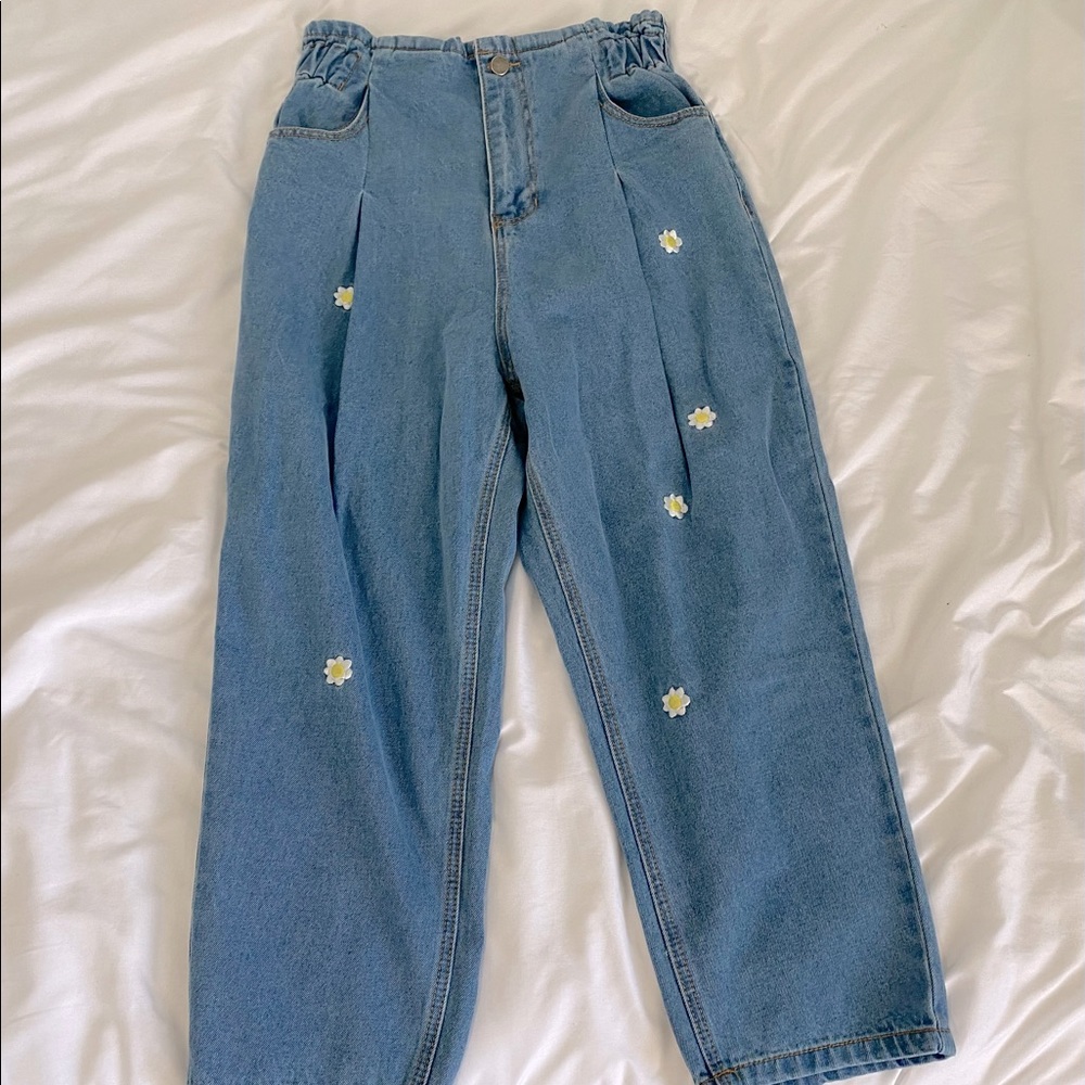 jeans with daisies.